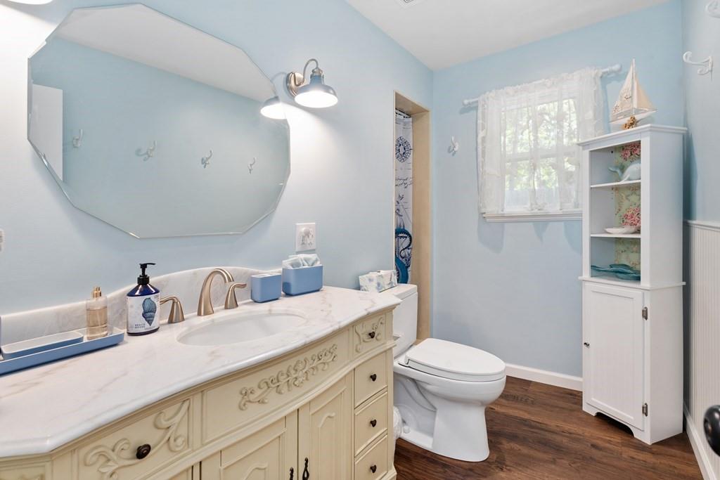 Main bathroom with shower & custom vanity sink