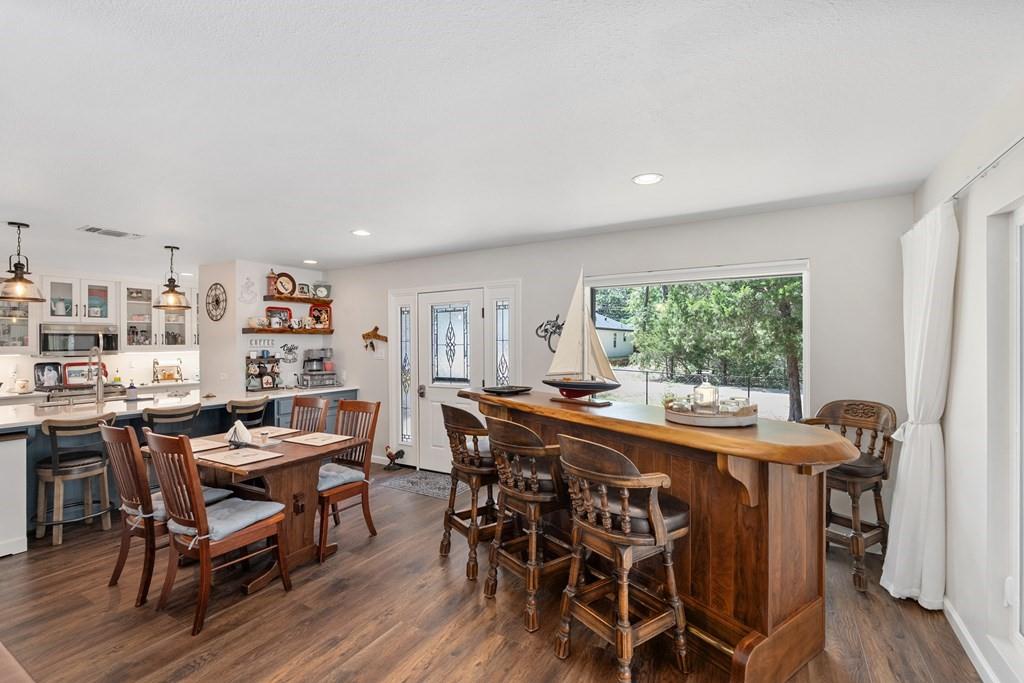 Open concept kitchen-dining-living