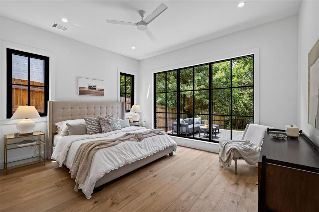 White interior walls complement the wood-finish flooring