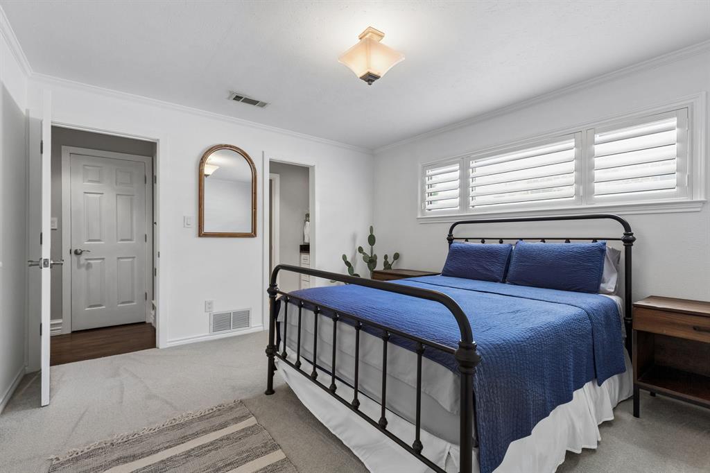 One of 2 large secondary bedrooms connected by jack and jill bath.