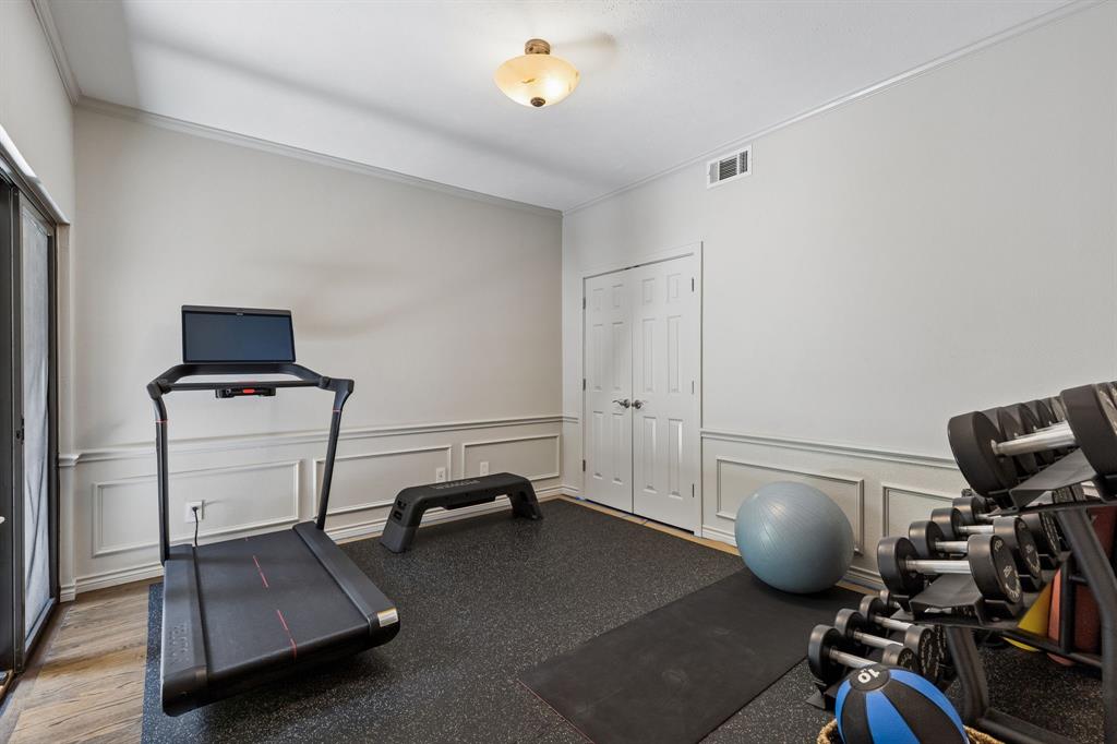 Currently used as an exercise room, but is a great guest room or home office with sliding door to secondary patio.