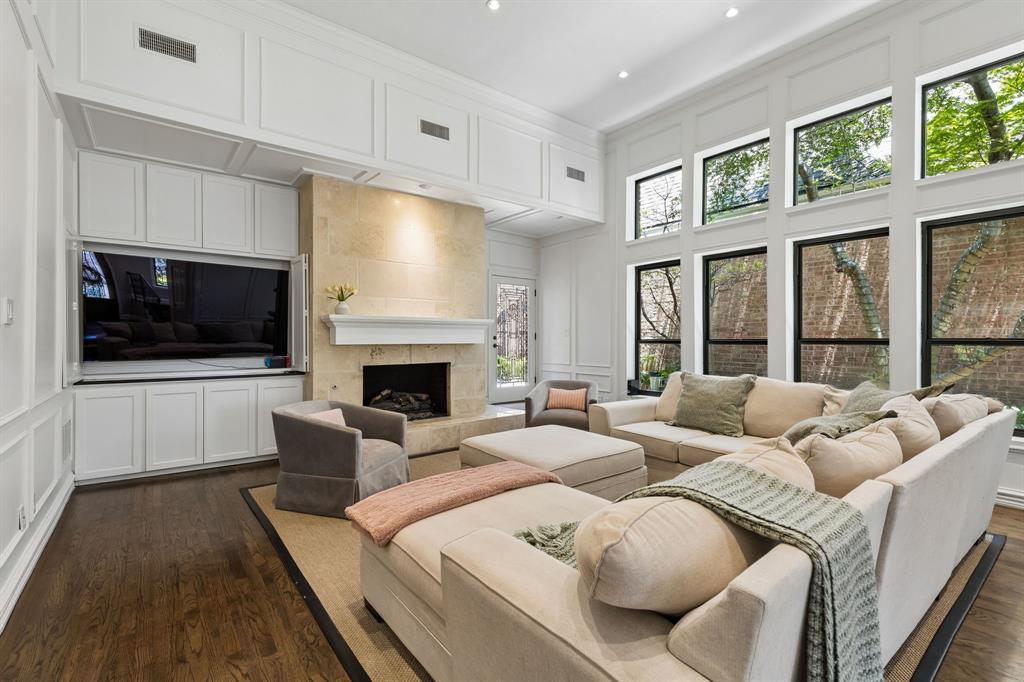 The travertine fireplace anchors the room beautifully.