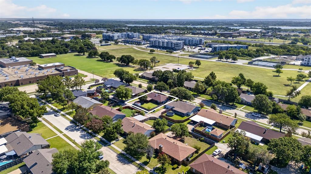 Large greenspace nearby with walking trail.