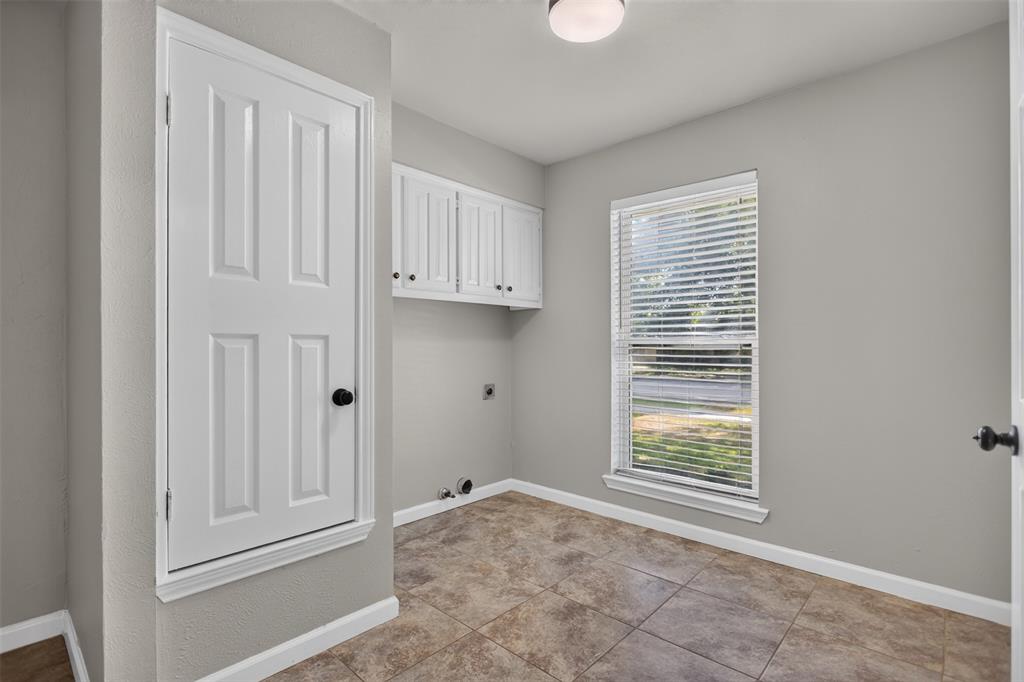 Laundry room has space for fridge or freezer
