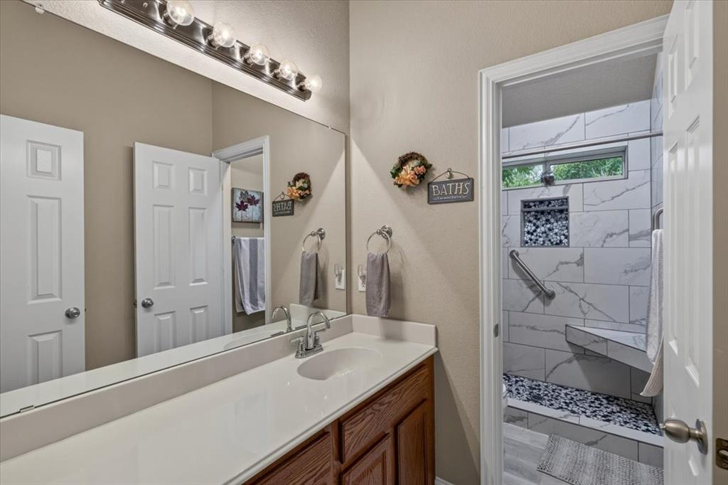 Hall bathroom with an updated shower