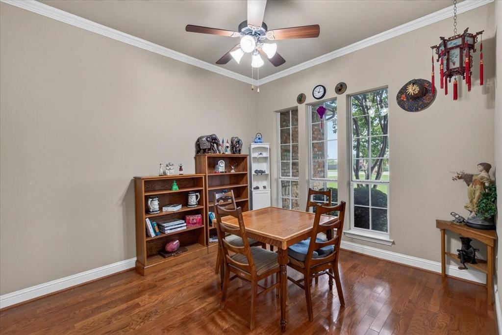 Formal dining room across from the home office as you enter the home.
