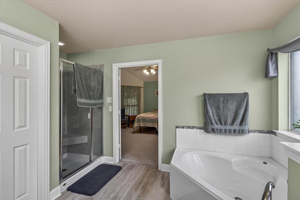 double sinks, garden tub, separate shower and walk in closet