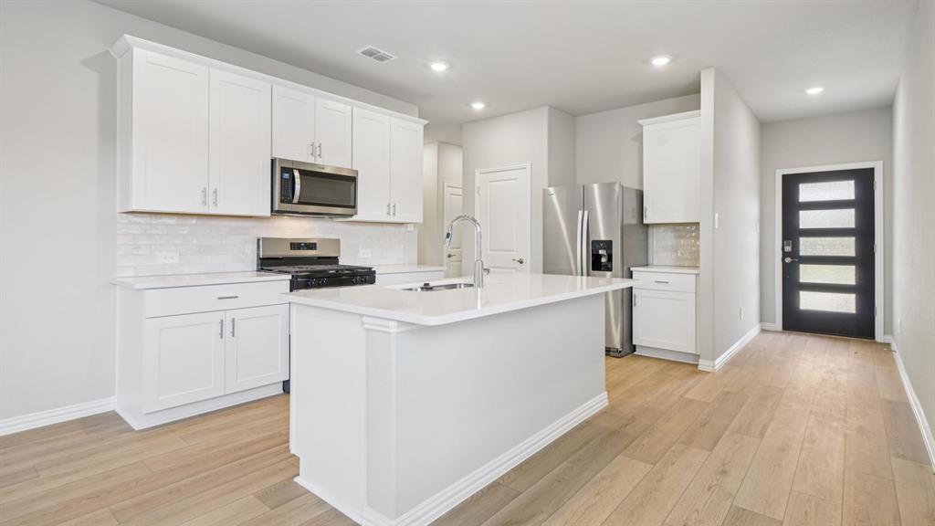 Photo is not of the actual home, but is an inspirational photo of builder’s model home and may depict options, furnishings, and/or decorator features that are not included