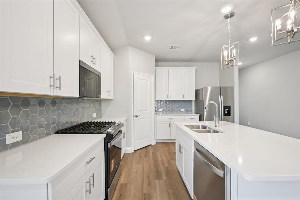 Photo is not of the actual home, but is an inspirational photo of builder’s model home and may depict options, furnishings, and/or decorator features that are not included.