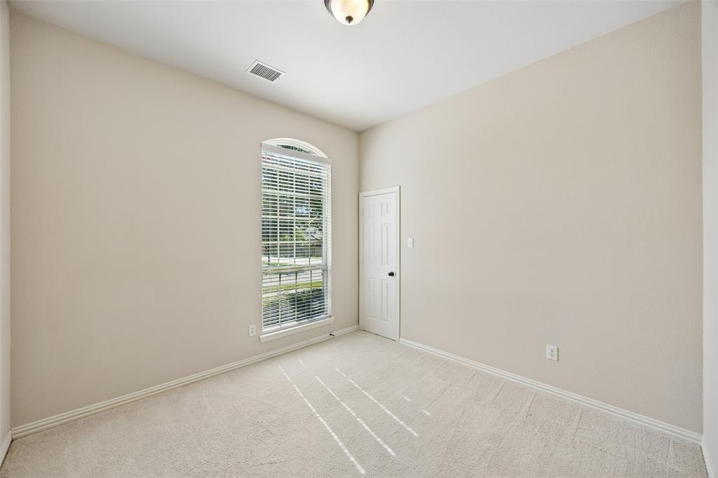 Secondary bedroom with large walk in closet