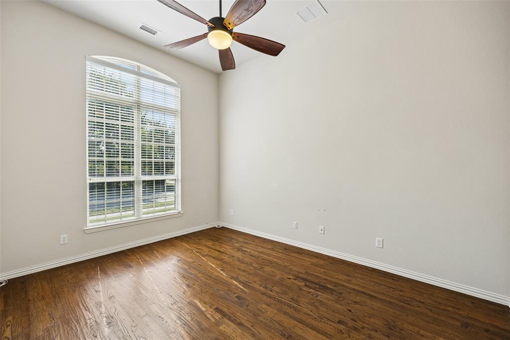Office featuring wood-finish flooring, and vaulted ceiling. Office featuring wood-finish flooring, and vaulted ceiling.