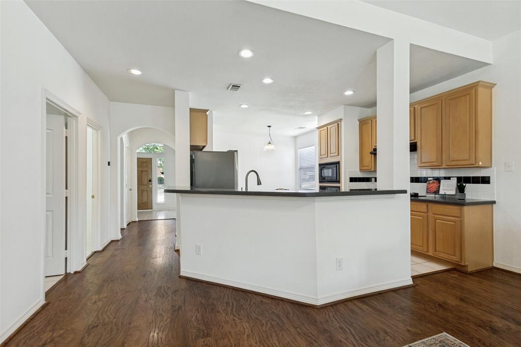 Large kitchen bar can fit stools and host all your friends