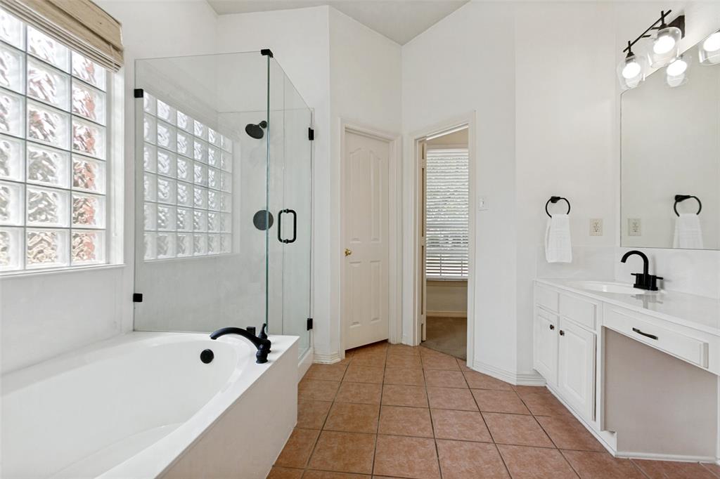 Seperate bathtub and stand up shower