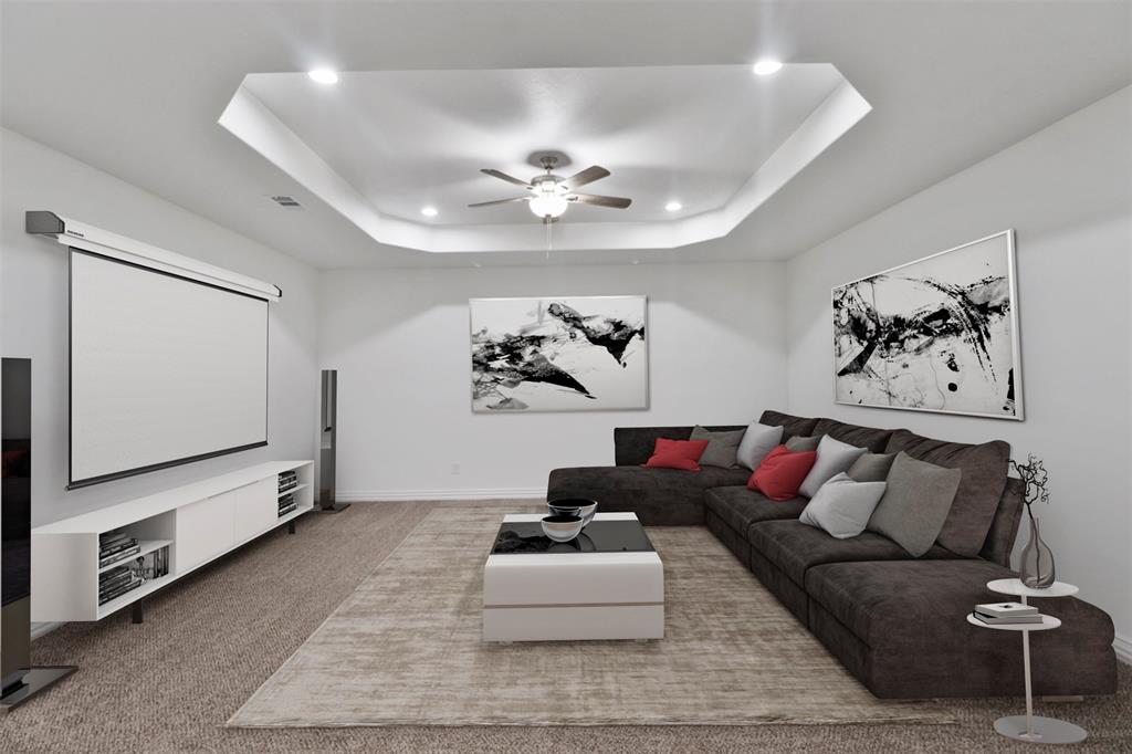 Recessed lighting illuminates a tray ceiling with a ceiling fan