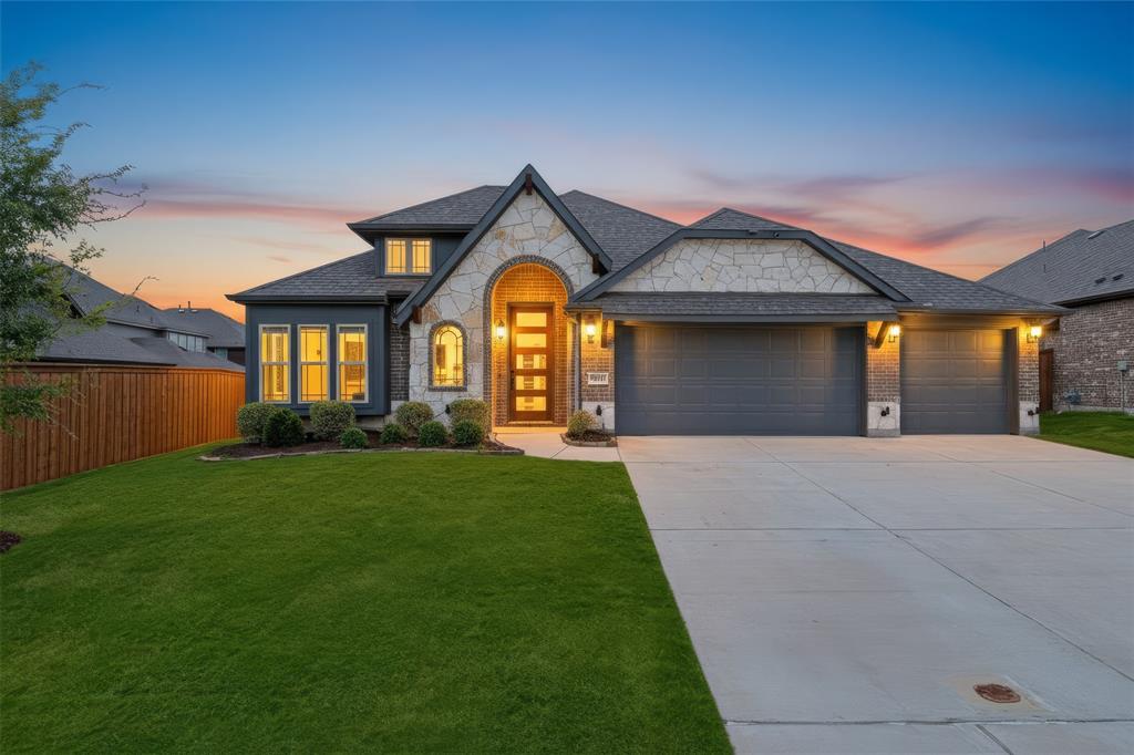 Stone and siding exterior with an arched entryway Stone and siding exterior with an arched entryway