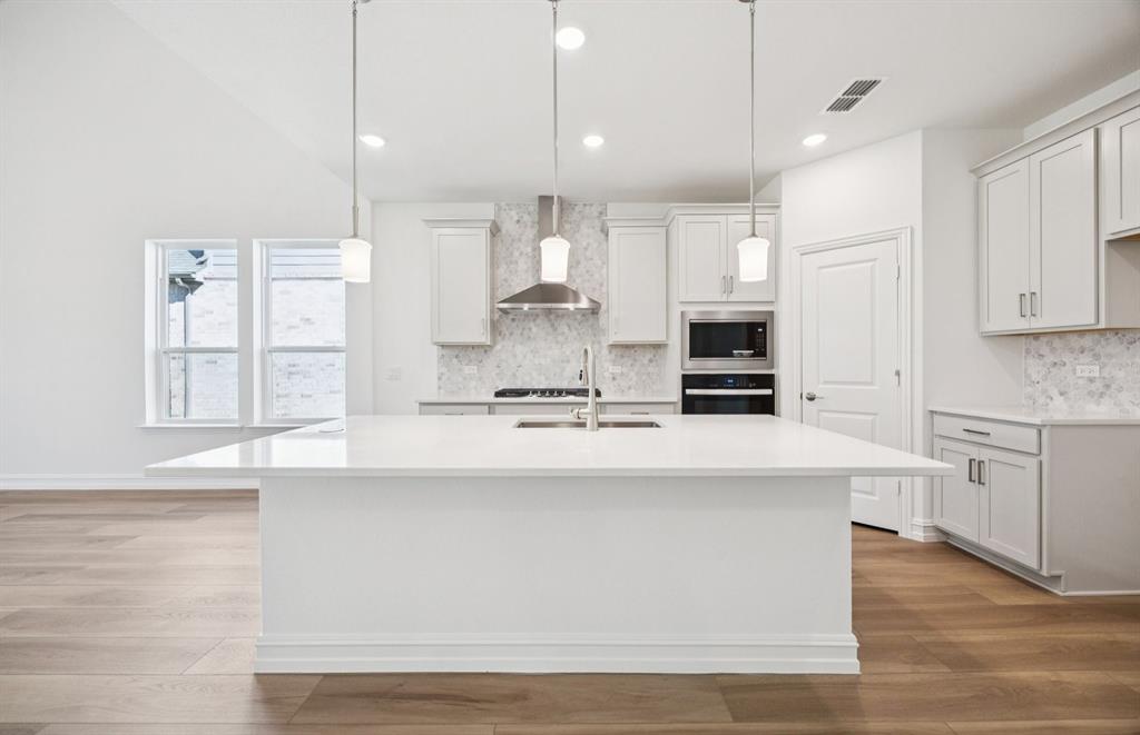 *Floorplan representation, not actual home - Spacious kitchen with eat-in bartop island