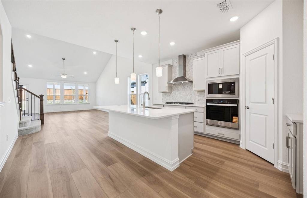*Floorplan representation, not actual home - Large island overlooking gathering room and dining areas