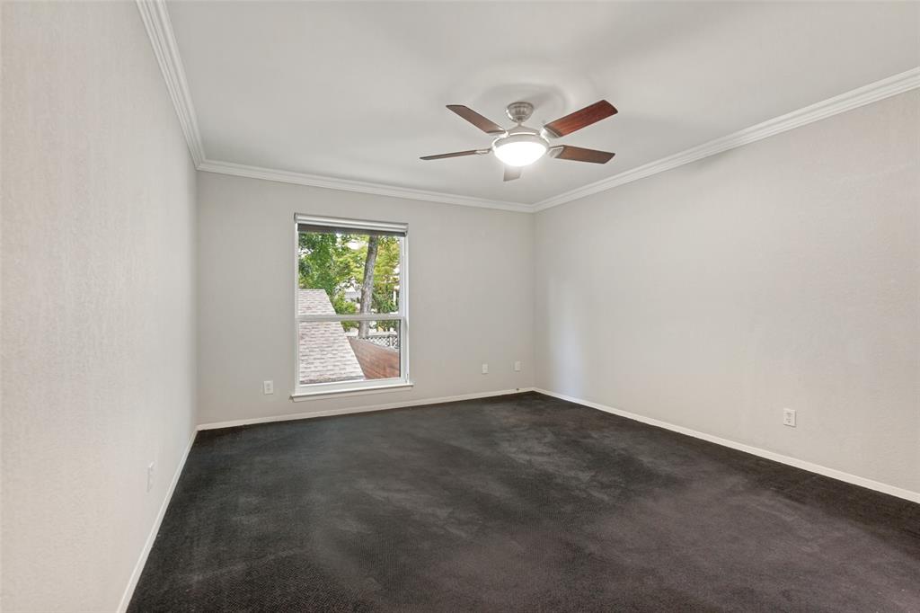 Bedroom with walk in closet and ensuite bathroom