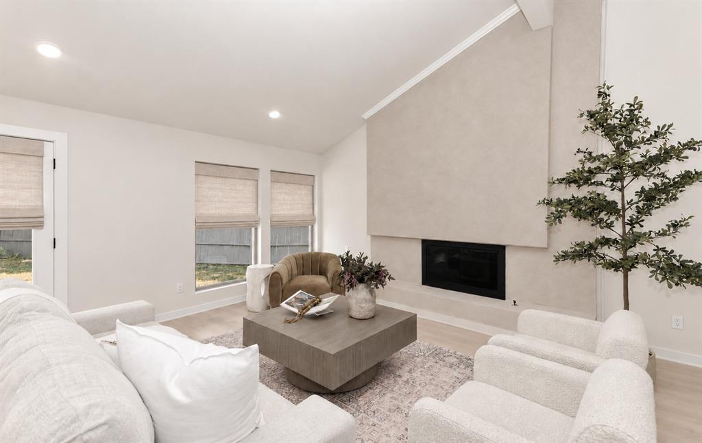Vaulted ceiling with an integrated fireplace makes for entertaining and cozy conversation Vaulted ceiling with an integrated fireplace makes for entertaining and cozy conversation