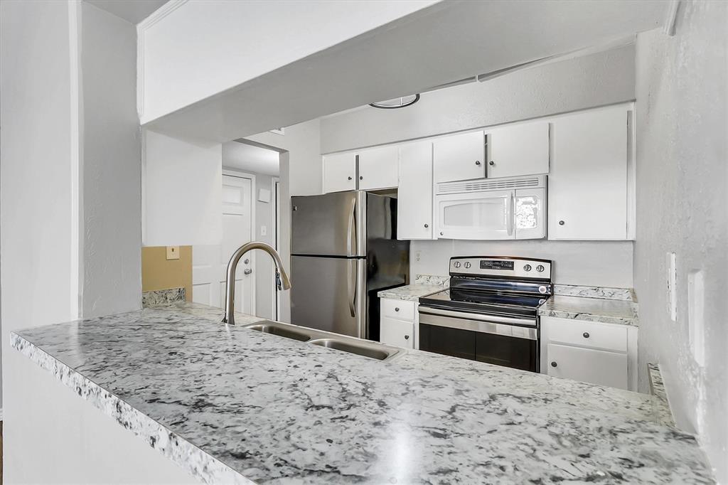 Ample cabinet space, stainless steel appliances Ample cabinet space, stainless steel appliances