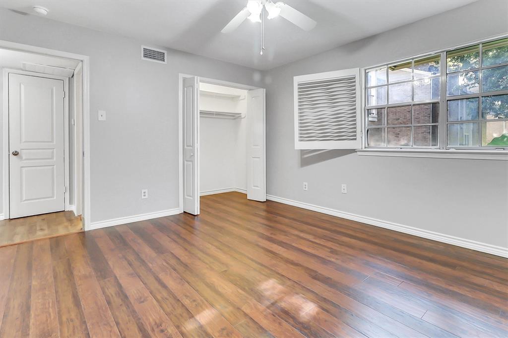 Large bedroom with ceiling fan Large bedroom with ceiling fan