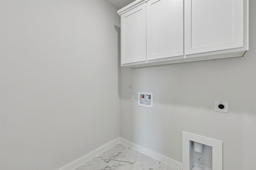 Utility Room in the Stanley II home plan by Trophy Signature Homes – REPRESENTATIVE PHOTO