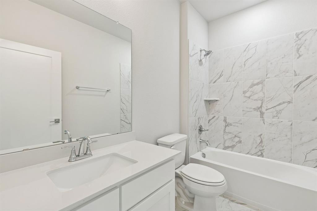 Bathroom in the Stanley II home plan by Trophy Signature Homes – REPRESENTATIVE PHOTO