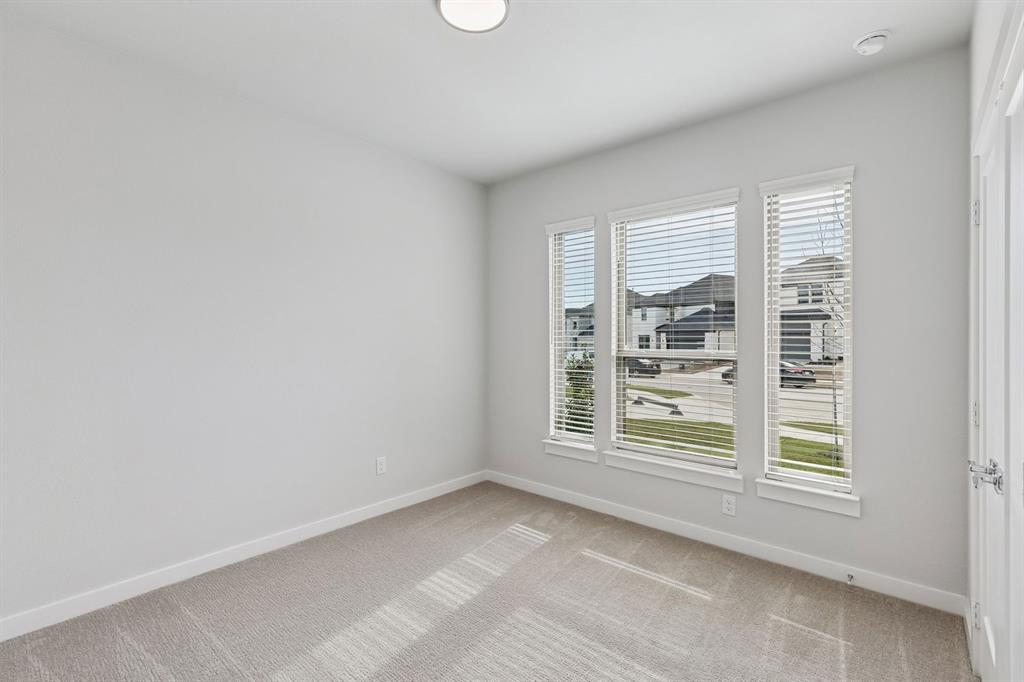 Bedroom in the Stanley II home plan by Trophy Signature Homes – REPRESENTATIVE PHOTO
