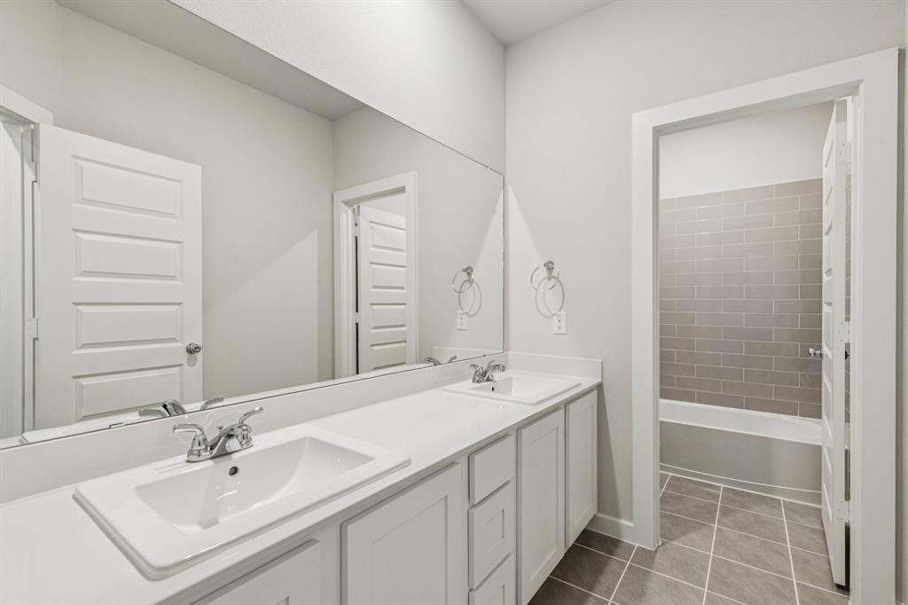 Bathroom in the Winters home plan by Trophy Signature Homes – REPRESENTATIVE PHOTO