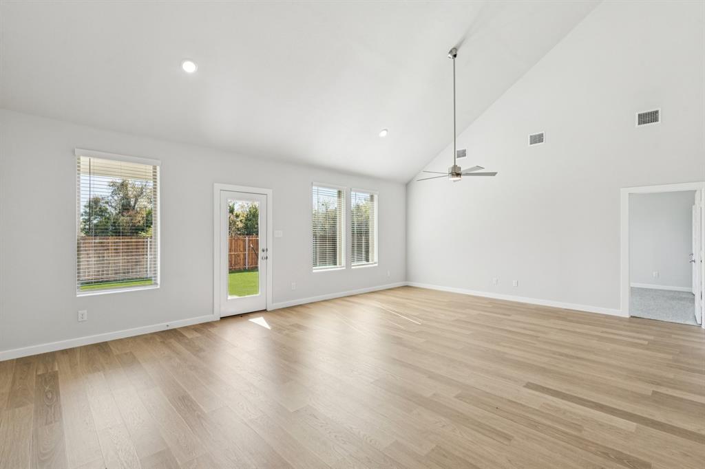 Living and Dining Rooms in the Winters home plan by Trophy Signature Homes – REPRESENTATIVE PHOTO