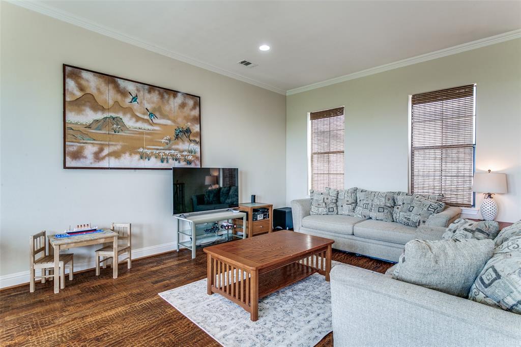 Generous living room with an open, airy feel and plenty of space for relaxing or entertaining.