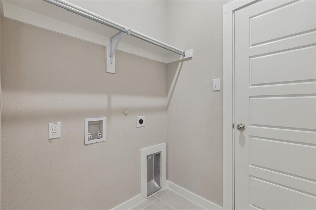 Utility Room in the Birch home plan by Trophy Signature Homes – REPRESENTATIVE PHOTO