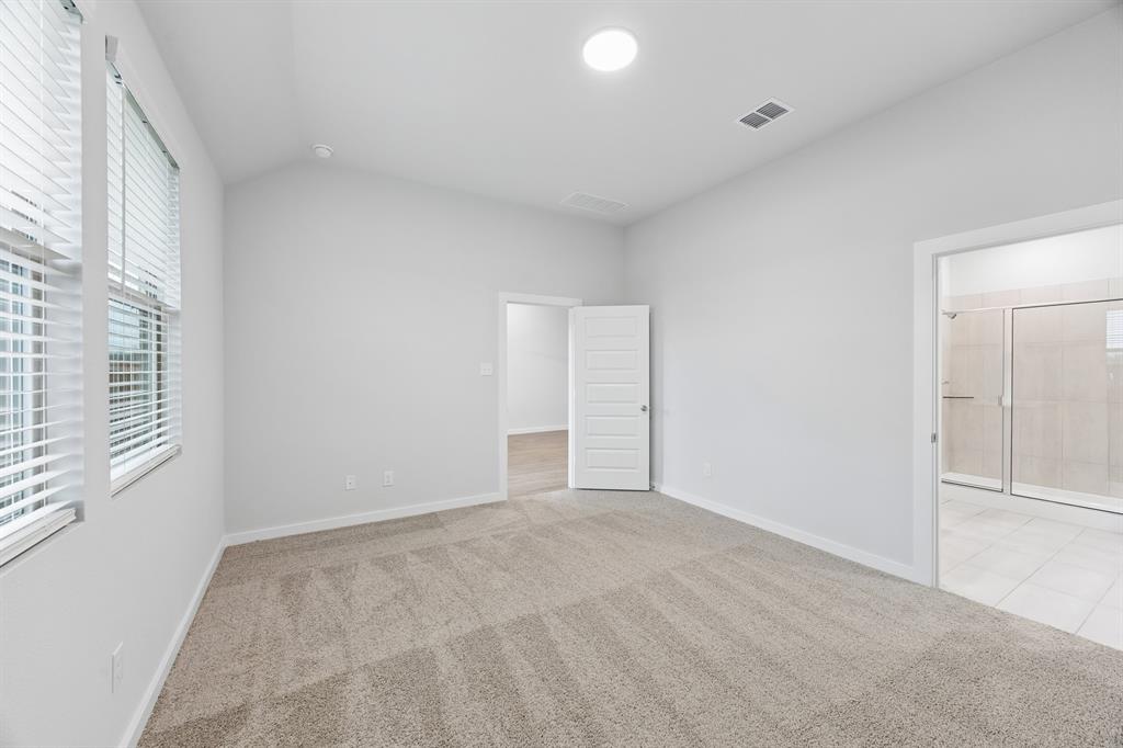 Primary Suite in the Cedar home plan by Trophy Signature Homes – REPRESENTATIVE PHOTO
