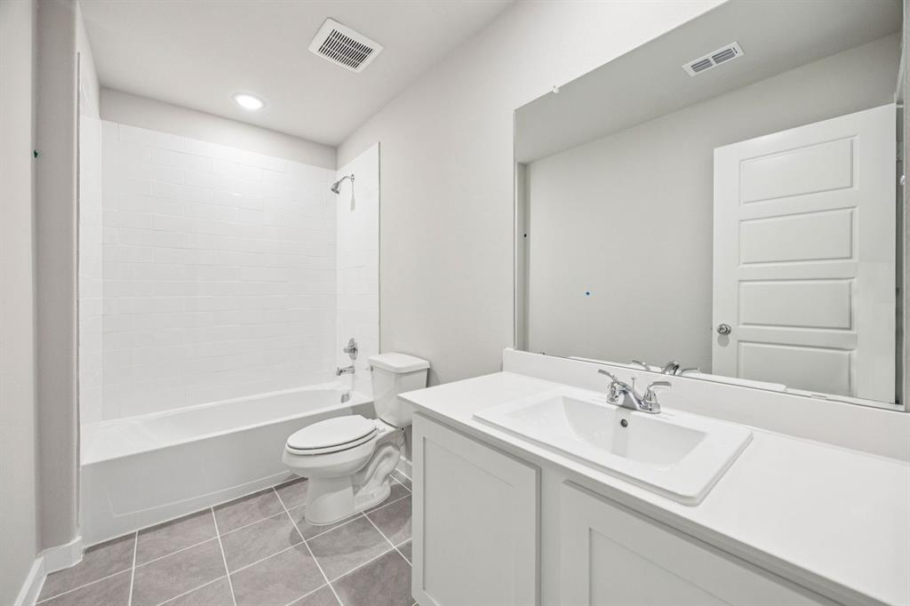 Bathroom in the Hayden home plan by Trophy Signature Homes – REPRESENTATIVE PHOTO