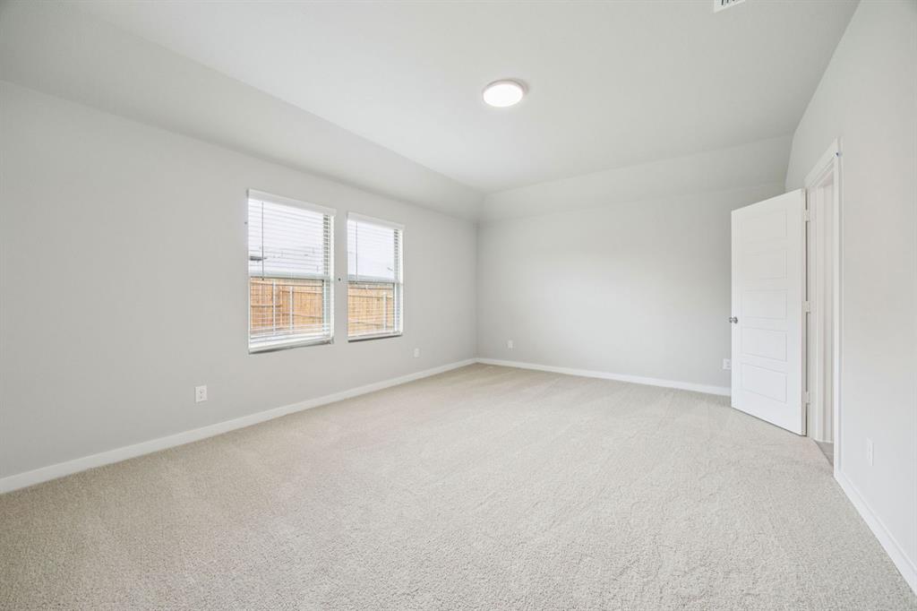 Primary Suite in the Hayden home plan by Trophy Signature Homes – REPRESENTATIVE PHOTO