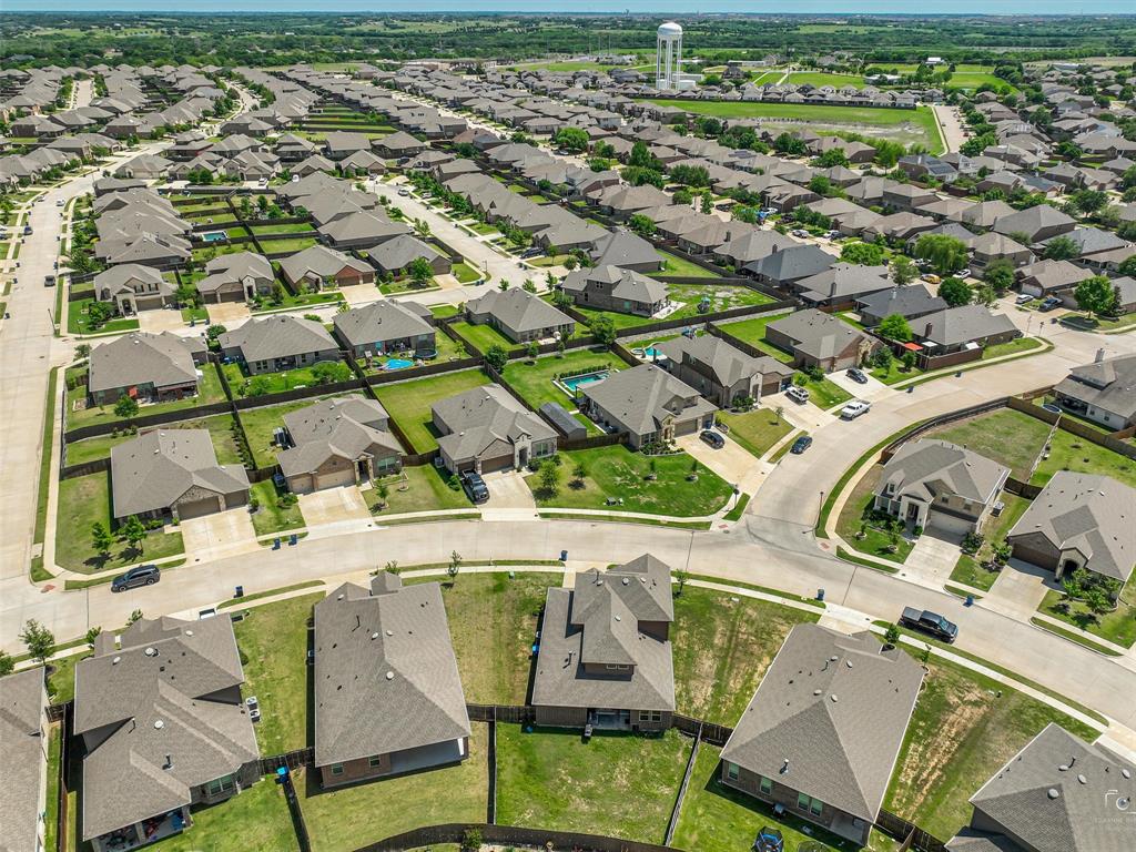 Expansive master-planned community featuring meticulously landscaped residential lots with mature trees, manicured green spaces, and tree-lined streets