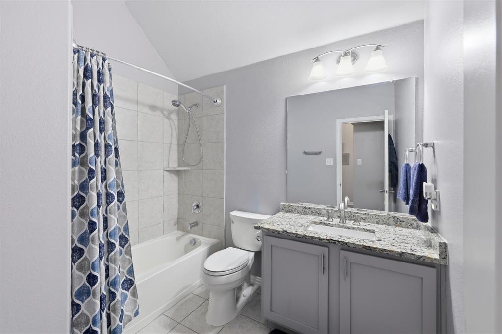 Secondary bathroom located in between additional bedrooms