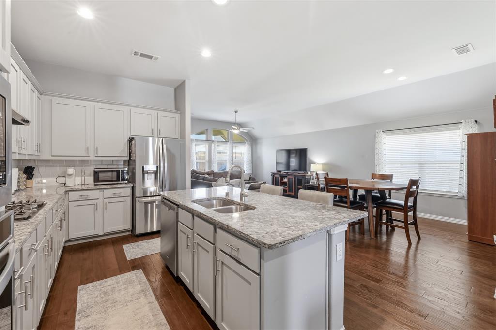 Open Concept floor plan, kitchen overlooks the dining area and living room