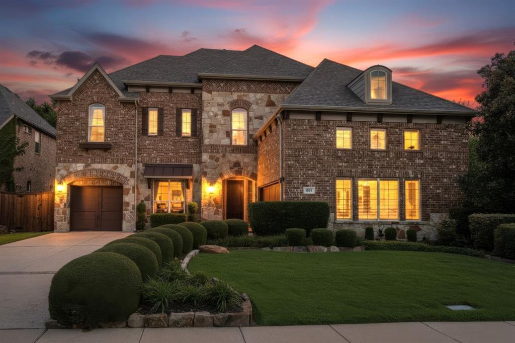 This impressive executive home, was the former Model features a gorgeous brick and stone facade, arched garage entry, large corner lot backing to a creek, and mature front landscaping with stone border.