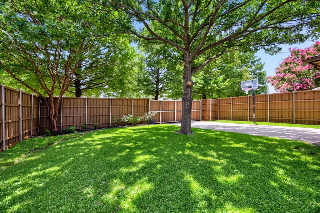Electric Sliding Fence in back yard allows for Plenty of space