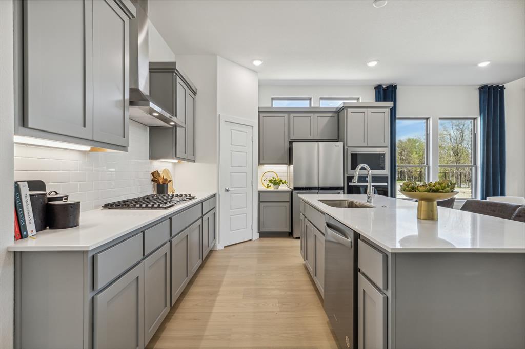 Kitchen in the Van Gogh II home plan by Trophy Signature Homes – REPRESENTATIVE PHOTO Kitchen in the Van Gogh II home plan by Trophy Signature Homes – REPRESENTATIVE PHOTO