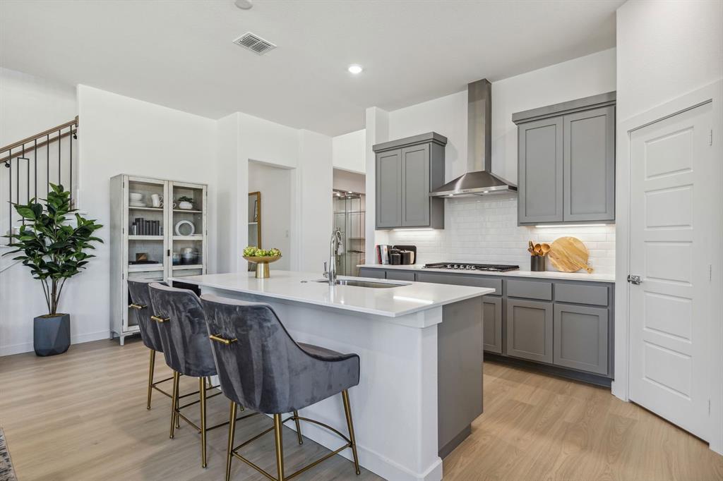 Kitchen in the Van Gogh II home plan by Trophy Signature Homes – REPRESENTATIVE PHOTO Kitchen in the Van Gogh II home plan by Trophy Signature Homes – REPRESENTATIVE PHOTO