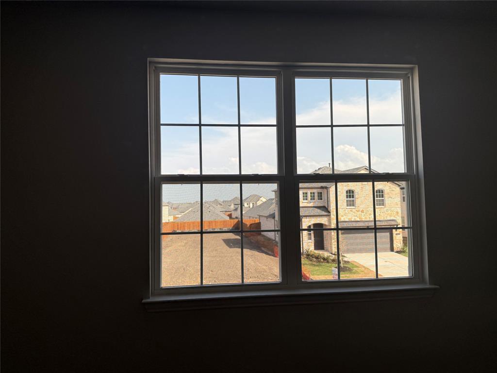 White-framed window with grid pattern