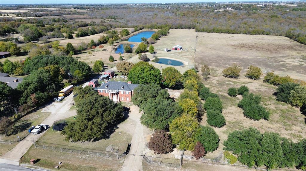 View of property location featuring rural landscape and a large body of water