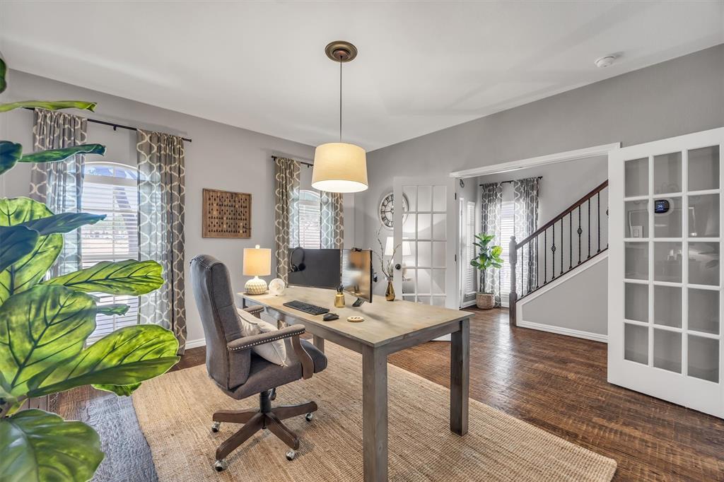 Bedroom has walk in closet being used as office