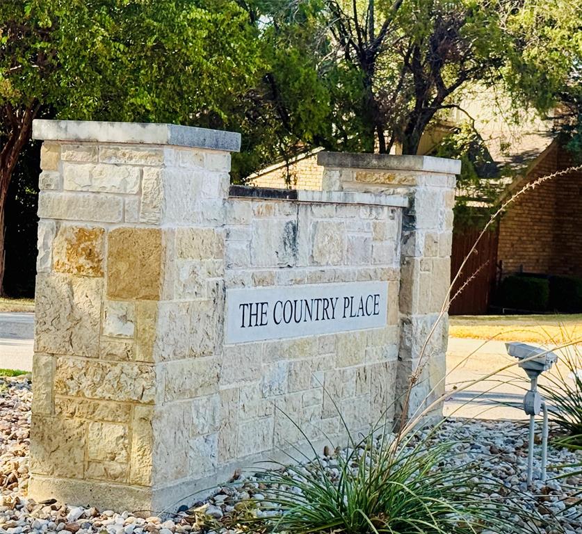 Stone masonry entrance monument for "The Country Place."