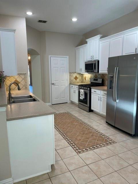 Updated kitchen cabinet color- painted as well as walls
