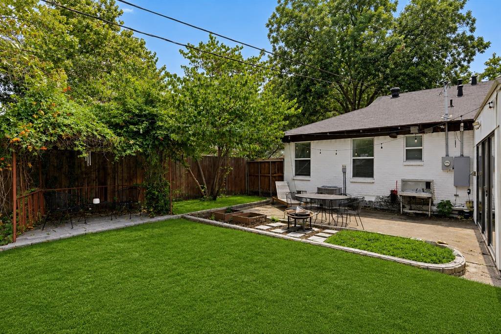 Expansive backyard with great patio. Grass has been digitally enhanced to be greener.