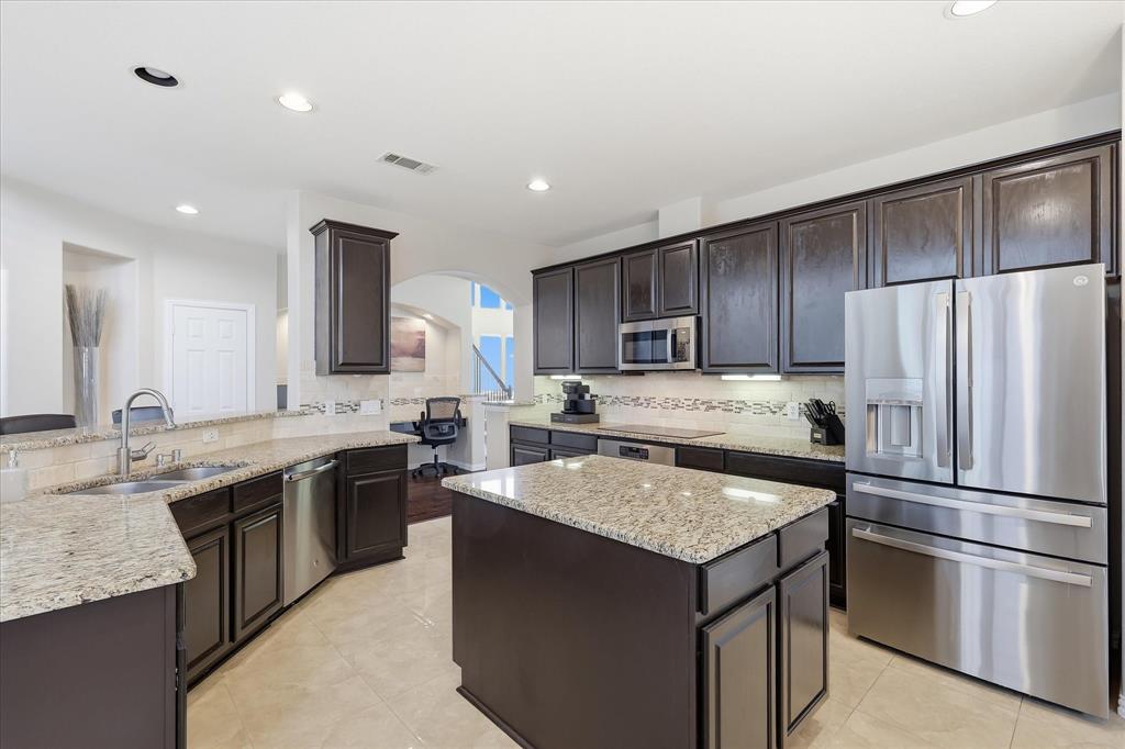 Kitchen offers plenty of storage and prep space