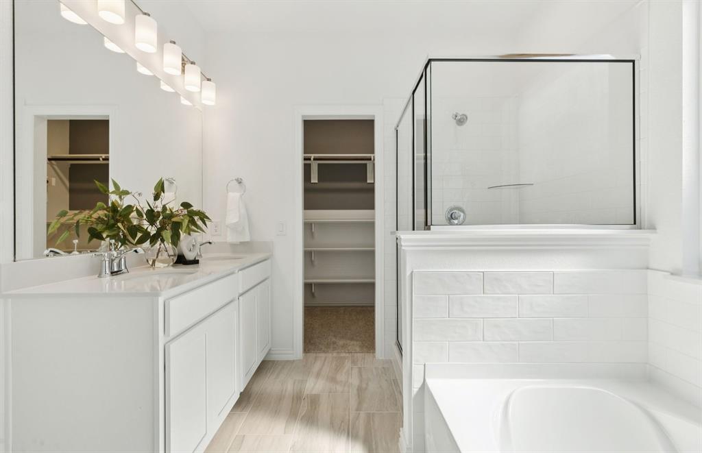 *Model Representation - Owner's private bath with double vanity